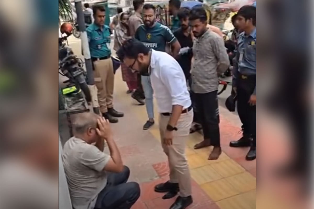 ঢাকার ফুটপাতে মারধরের ঘটনায় যুবক আটক, দাঁড়িয়ে থাকা পুলিশ সদস্য প্রত্যাহার
